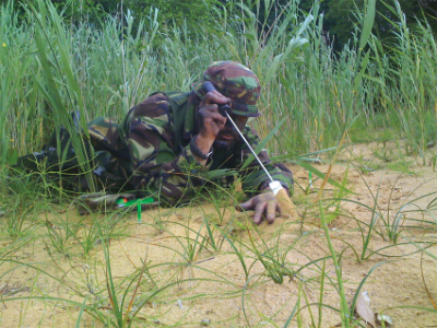 Military using a PMEK to mark potentially dangerouse mine area